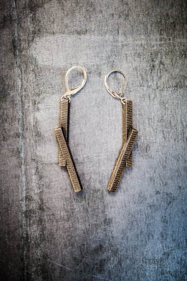Stickii bronzed steel earrings